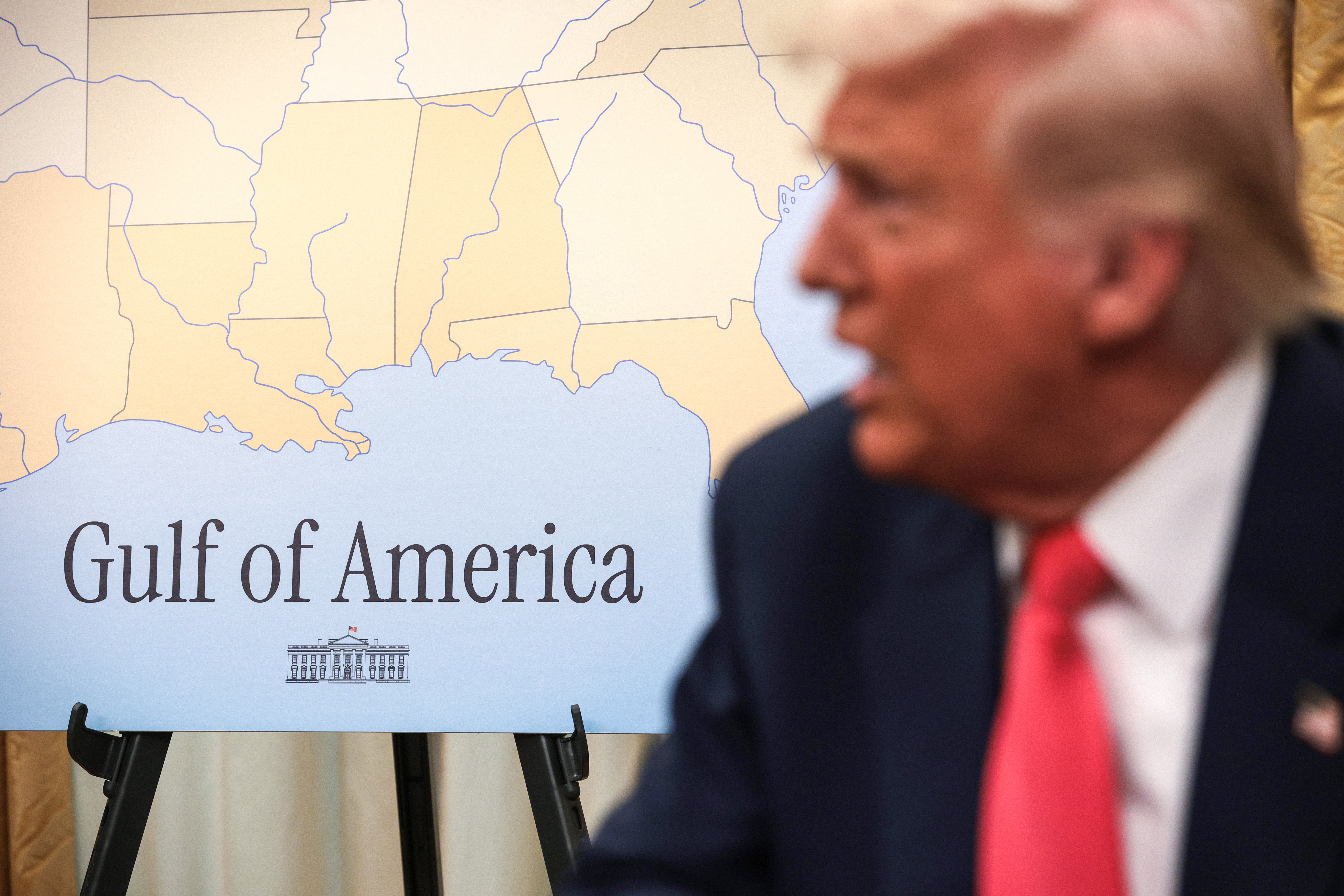 A map of the ‘Gulf of America’ is seen as U.S. President Donald Trump speaks before signing executive orders in the Oval Office of the White House in 2025