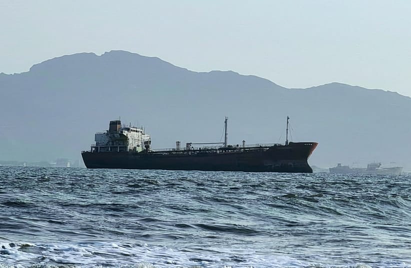 A ship off the port of Aden, where traffic remained steady after the Iran-aligned Houthis said their forces had carried out missile and drone strikes on Saudi oil tankers, in Aden, Yemen, July 23, 2026. 