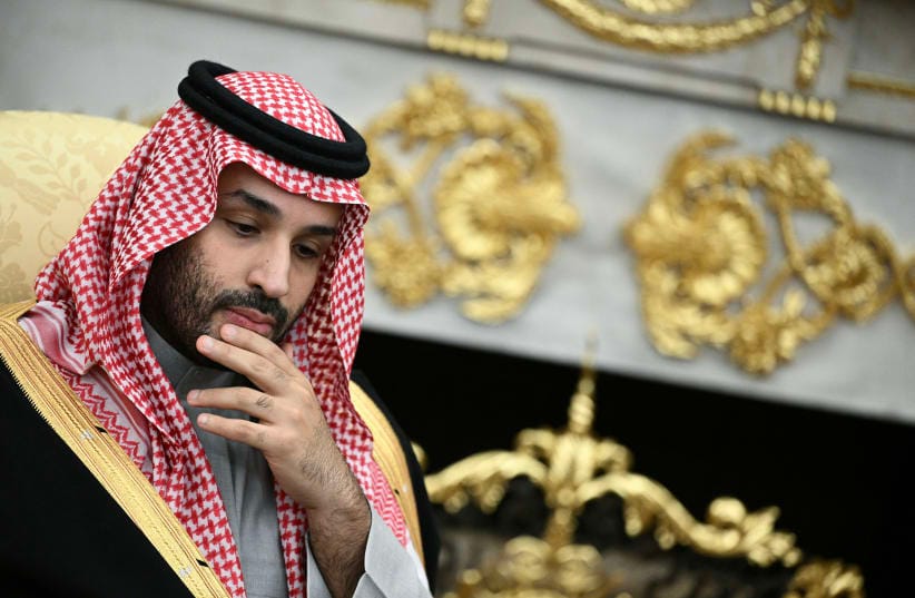 Crown Prince and Prime Minister of the Kingdom of Saudi Arabia Mohammed bin Salman looks on during a meeting with US President Donald Trump (not pictured) in the Oval Office of the White House in Washington, DC on November 18, 2025.
