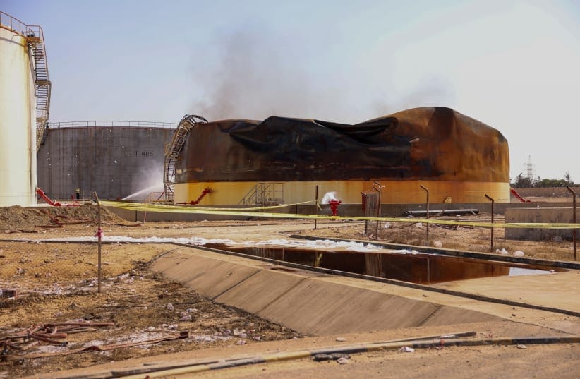 A fuel tank after fire was extinguished at the Zawiya oil complex following drone strikes, in Zawiya, Libya, August 12, 2026.