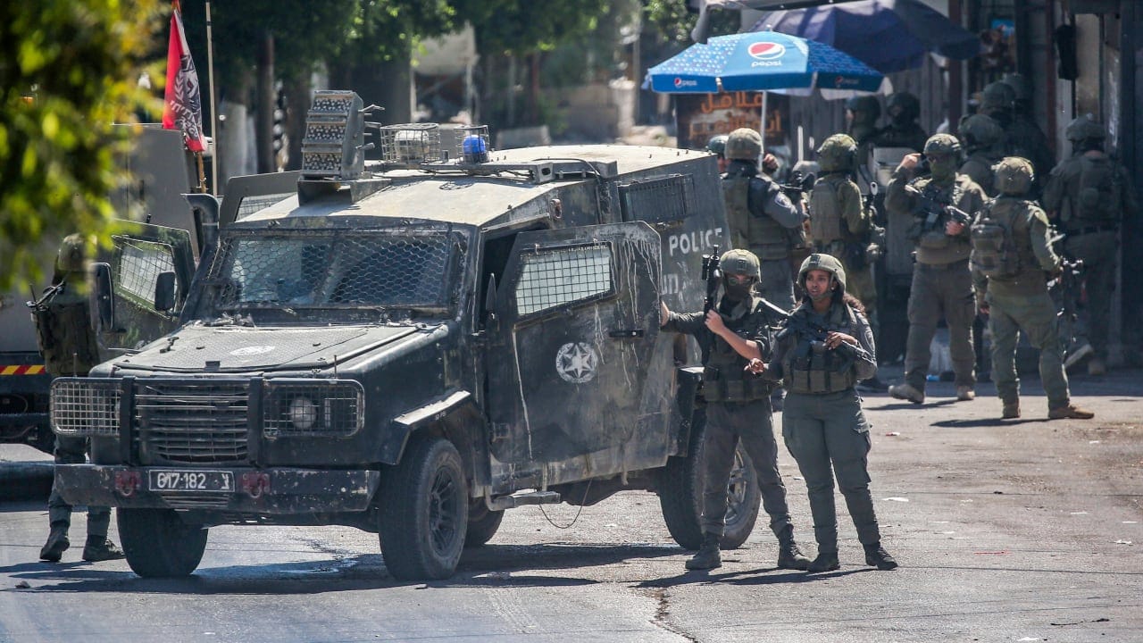 [ILLUSTRATIVE] Israeli Border Police officers patrol outside Damascus Gate in Jerusalem’s Old City during the beginning of the holy fasting month of Ramadan, February 18, 2026.