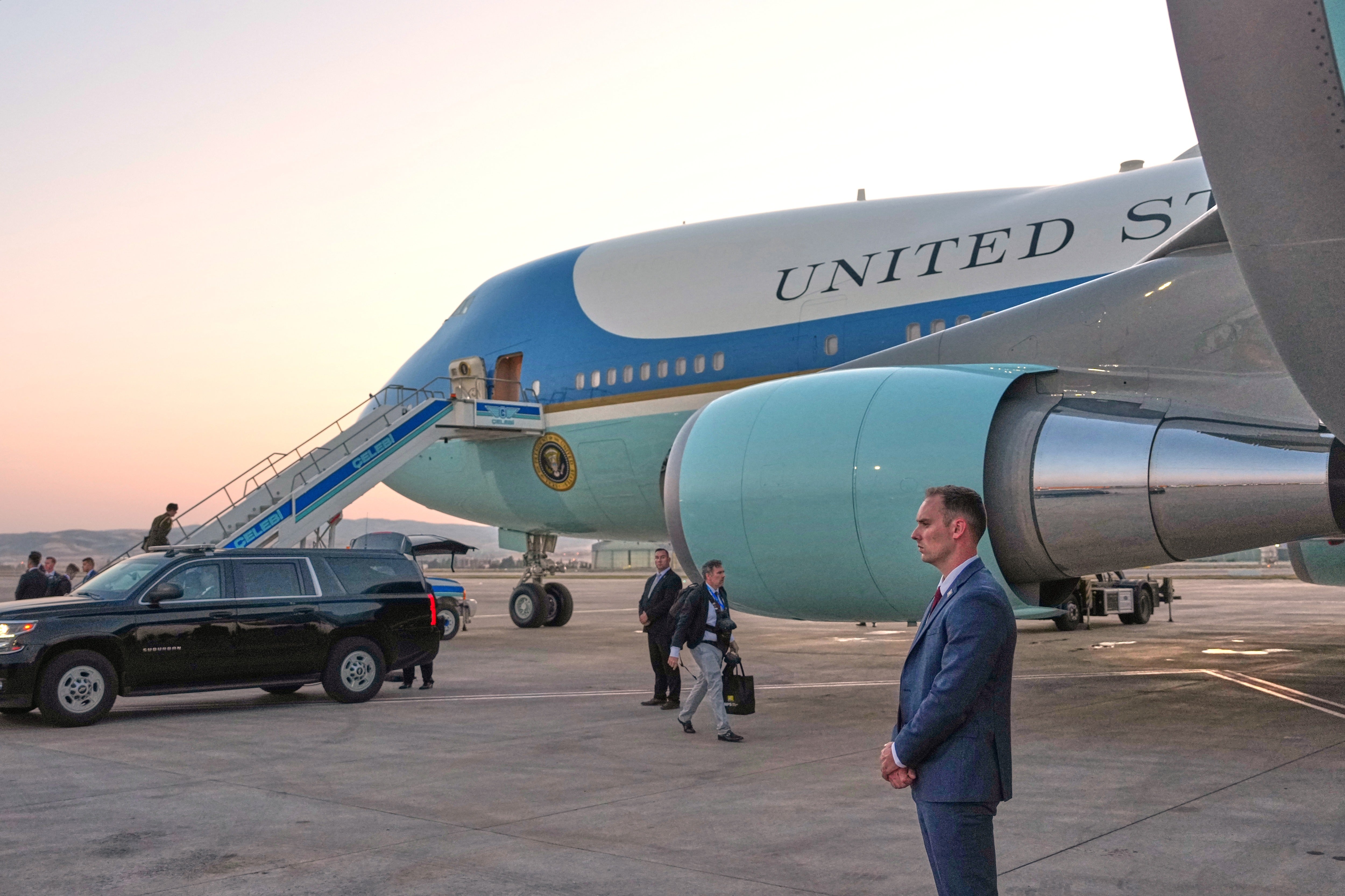 The catering truck used to transport President Trump to the smaller plane in which he secretly left Turkey is seen parked next to the legacy Air Force One at Ankara Esenboga Airport on July 8