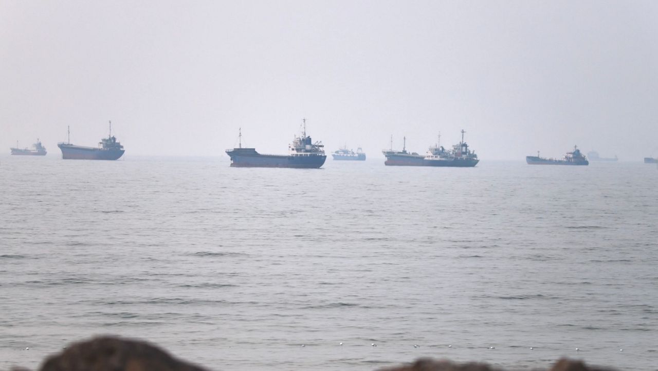 Commercial vessels are seen in the Strait of Hormuz off Bandar Abbas, Iran, Tuesday, June 30, 2026. (Amirhosein Khorgooi/ISNA via AP, File)