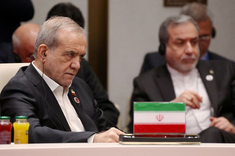 Iran urges US to comply with interim deal after Trump threatens further strikes