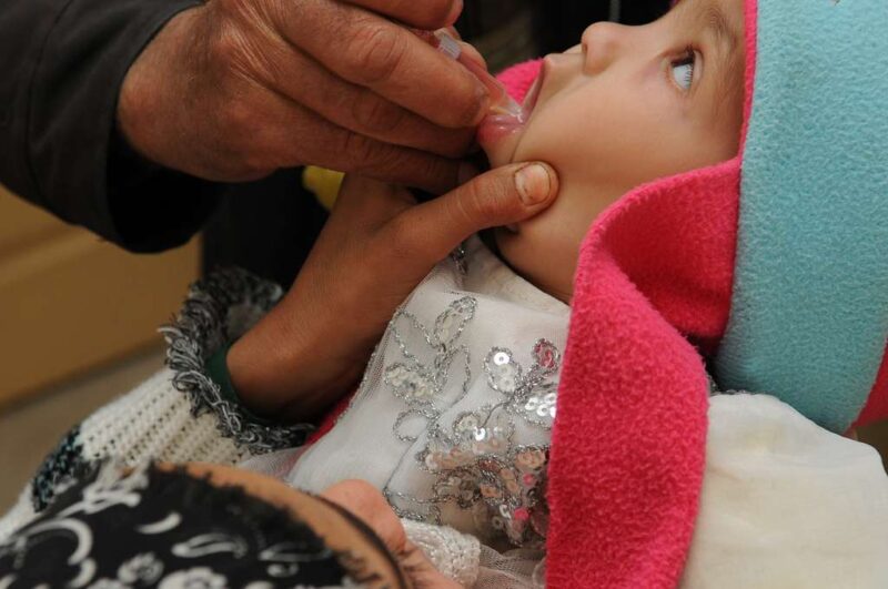 A baby gets a polio vaccination in Afghanistan