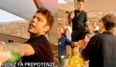 Fedez tira un calcio a un giovane che lo riprende col cellulare in un locale: il video