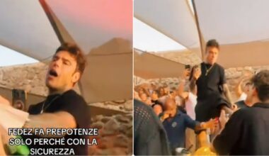 "Fa il prepotente solo perché è con la sicurezza": Fedez infastidito tira un calcio verso il fan che lo riprende