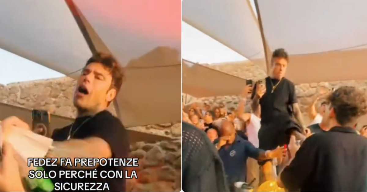 "Fa il prepotente solo perché è con la sicurezza": Fedez infastidito tira un calcio verso il fan che lo riprende