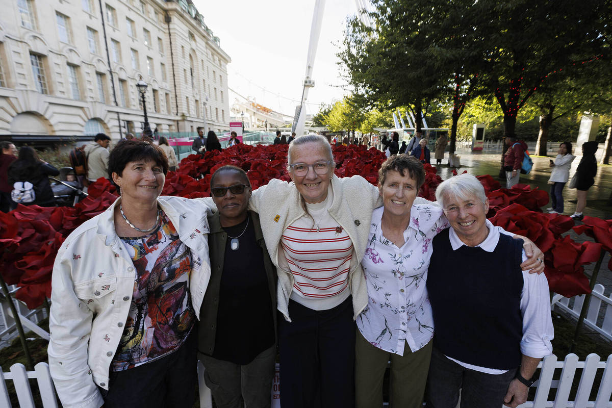 Former England Rugby players, Janis Ross, Maxine Edwards, Gill Burns, Karen Almond and Emma Mitchell at the unveiling of an installation titled The Trail of Roses, featuring 267 red roses