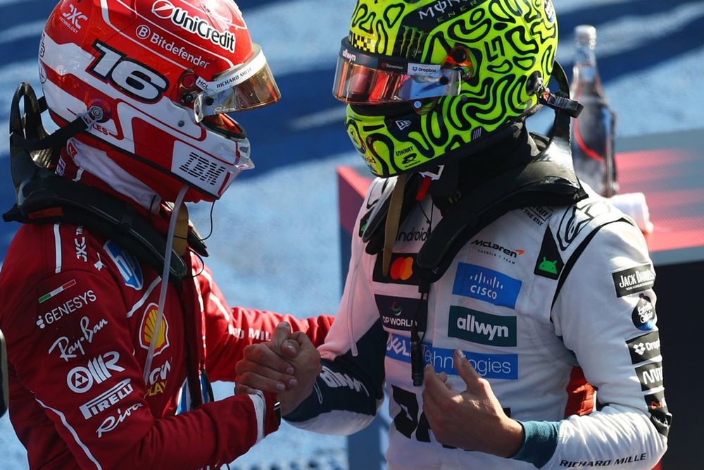 Charles Leclerc, Ferrari, festeggia il secondo posto con Lando Norris, McLaren