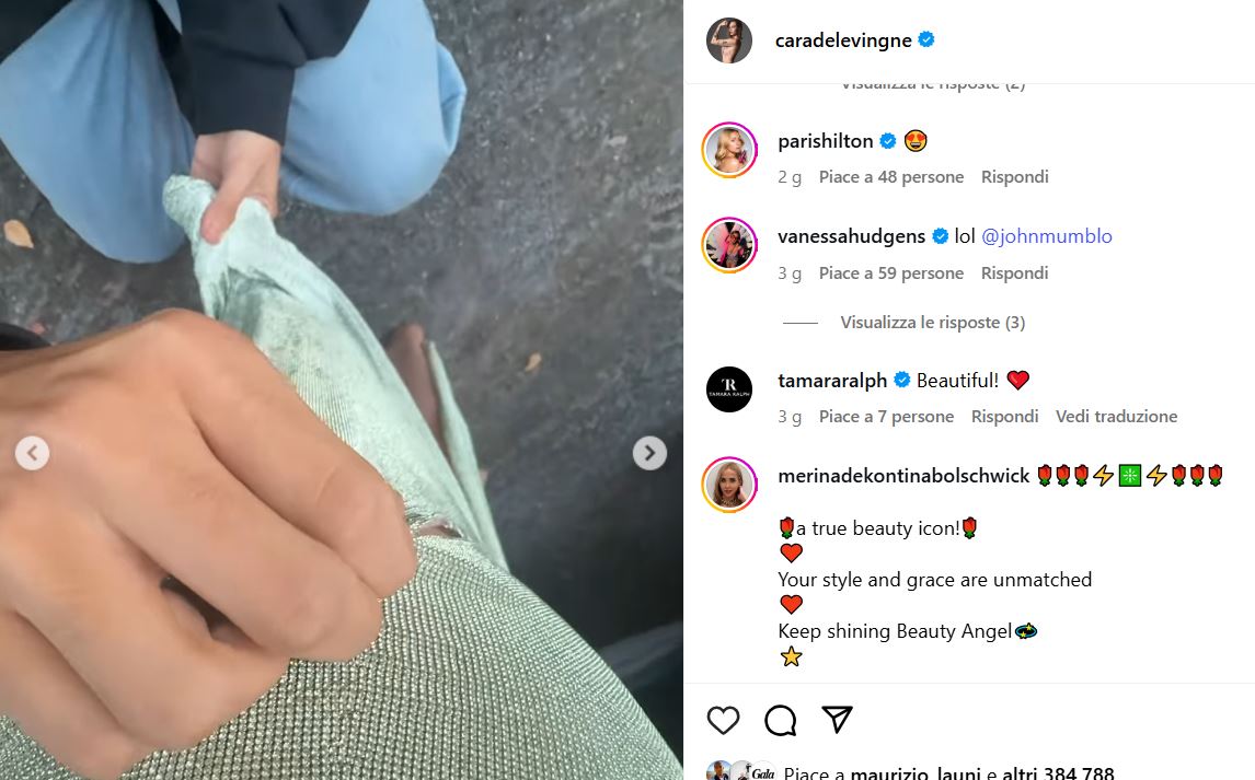 Cara Delevingne, sul red arpet l'abito si strappa: lo cuce lo stylist dietro le quinte