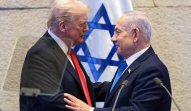 US President Donald Trump (L) speaks with Israeli Prime Minister Benjamin Netanyahu at the Israeli parliament, the Knesset, in Jerusalem on October 13, 2025. Hamas handed over the 20 surviving Israeli hostages on October 13 under a ceasefire...