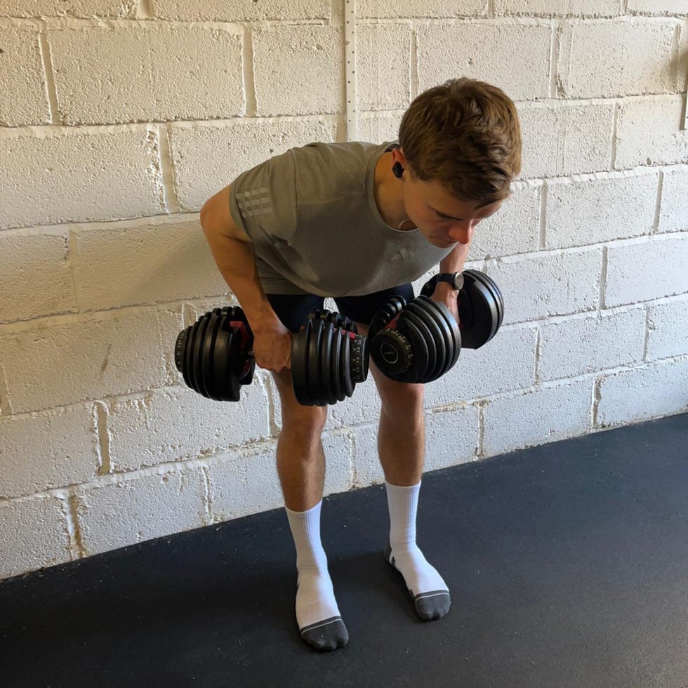 person performing a bentover exercise with dumbbells