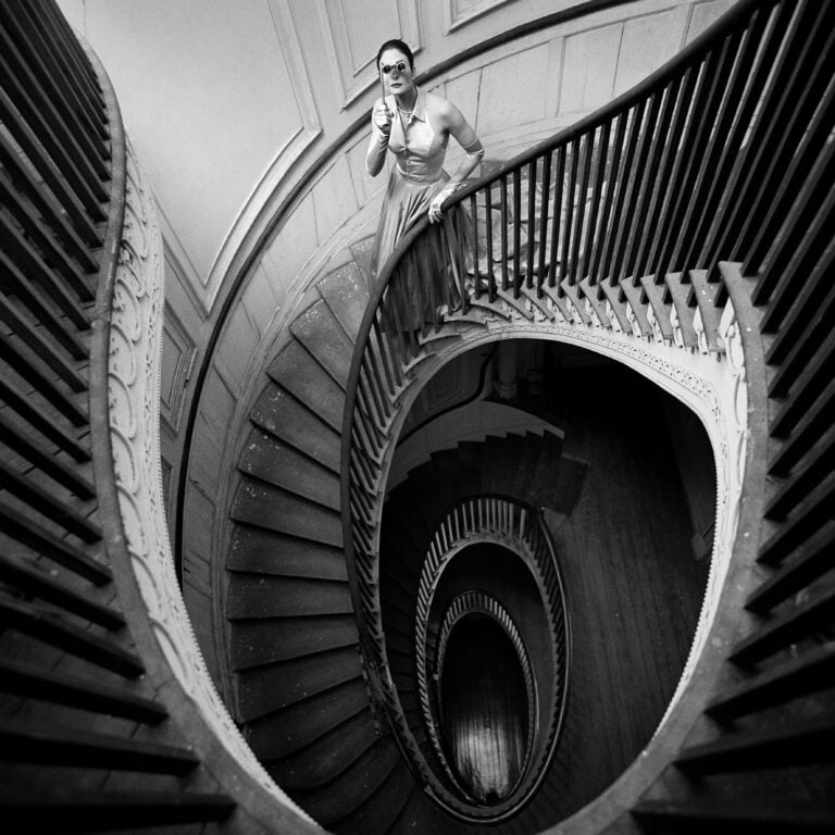 Caroline at the Top of Circular Staircase, Charleston, South Carolina, 2000. Credits: Rodney Smith