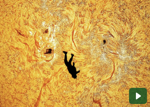 Un paracadutista vola davanti al Sole, la foto lascia senza parole