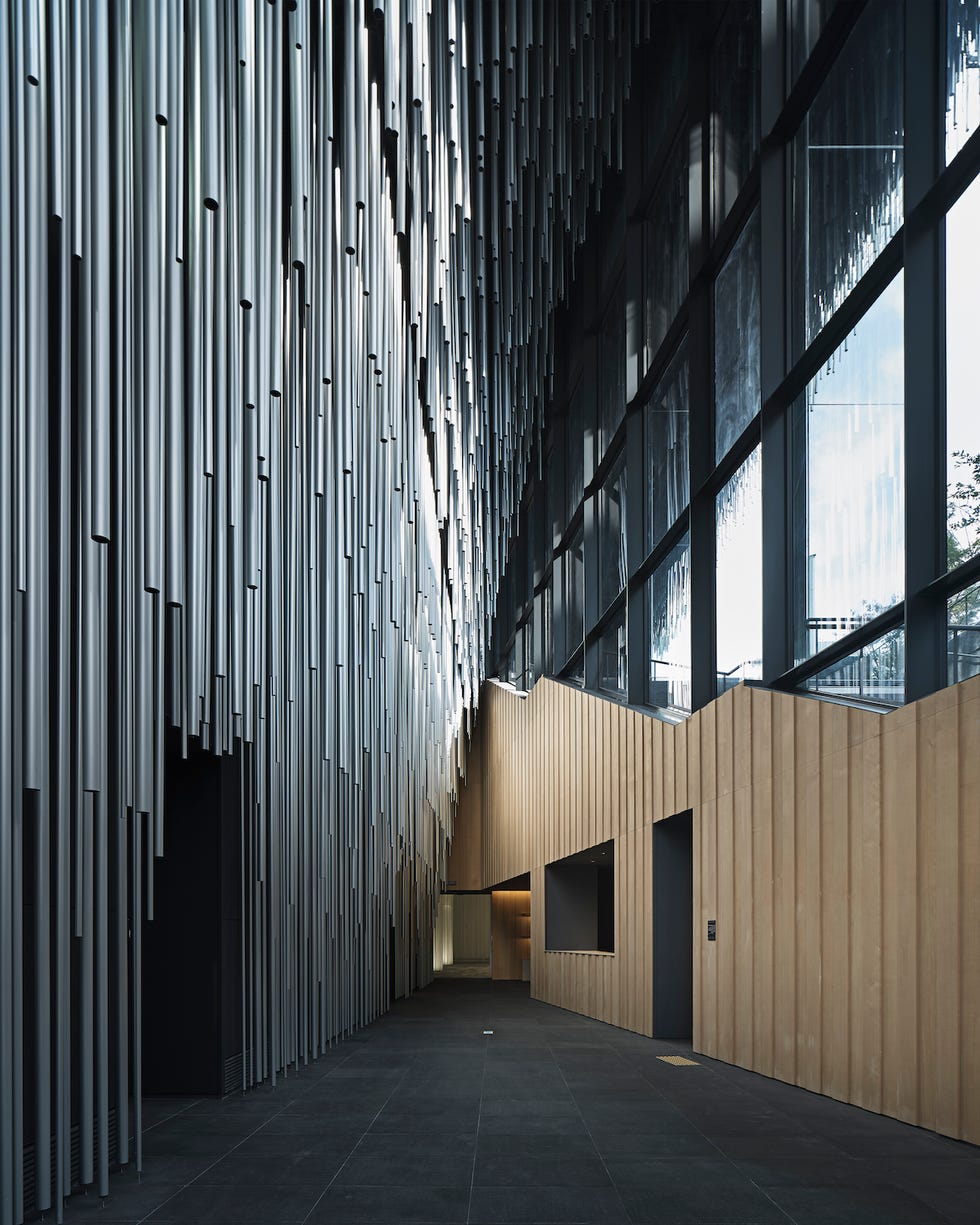 modern architectural corridor with contrasting materials and lighting