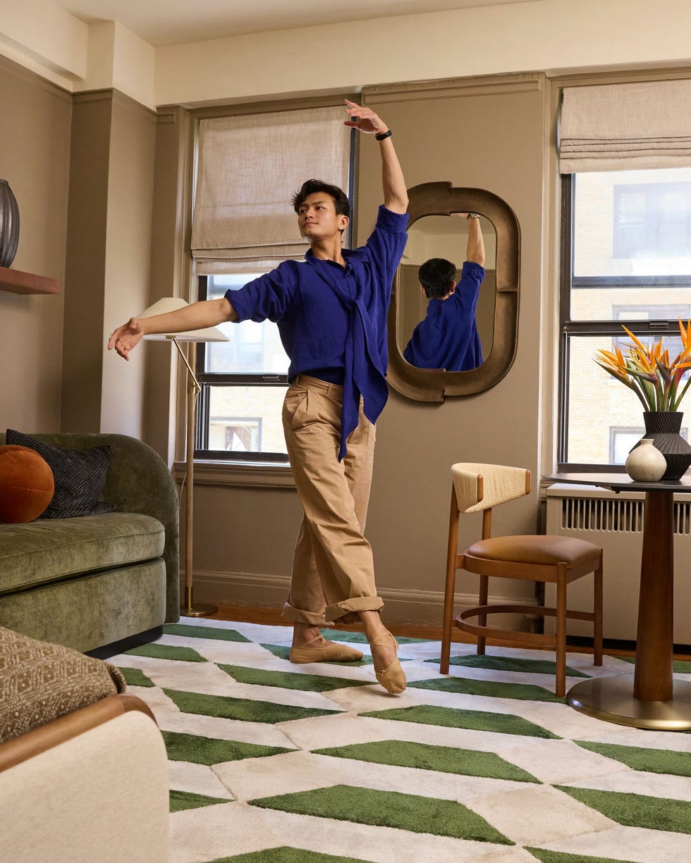 a dancer performing in a welldecorated indoor space