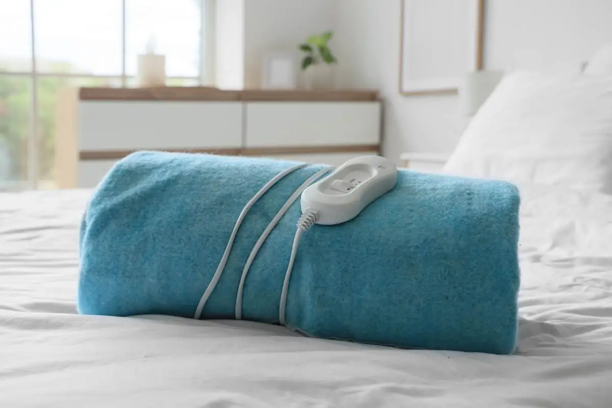 Scaldaletto elettrico Scaldaletto elettrico su un letto