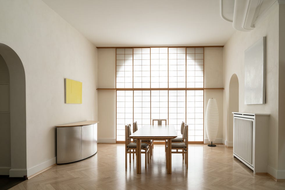 modern dining area with wooden table and minimalist decor