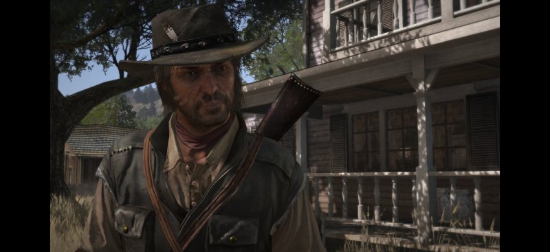 John Marston di fronte a casa di Bonnie in Red Dead Redemption John Marston di fronte a casa di Bonnie in Red Dead Redemption