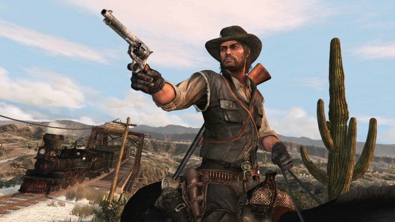 John Marston si prepara ad aprire il fuoco in Red Dead Redemption John Marston si prepara ad aprire il fuoco in Red Dead Redemption