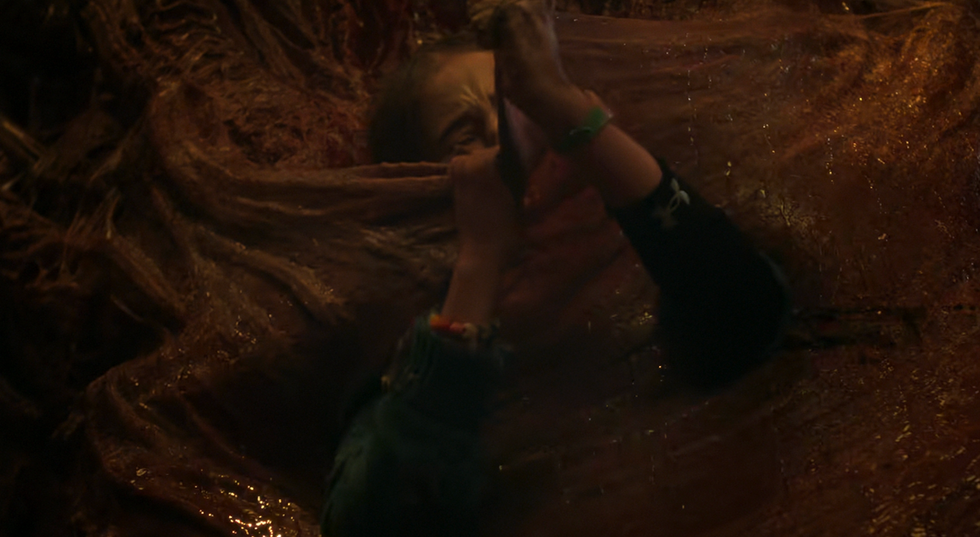 a person struggling in a thick viscous substance appearing trapped