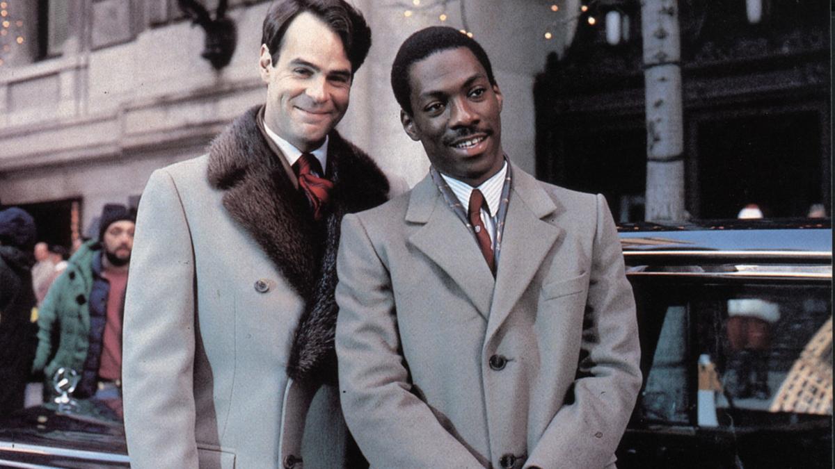 Il finale di ‘Una poltrona per due’ ri-spiegato: da 28 anni è il rompicapo della vigilia di Natale