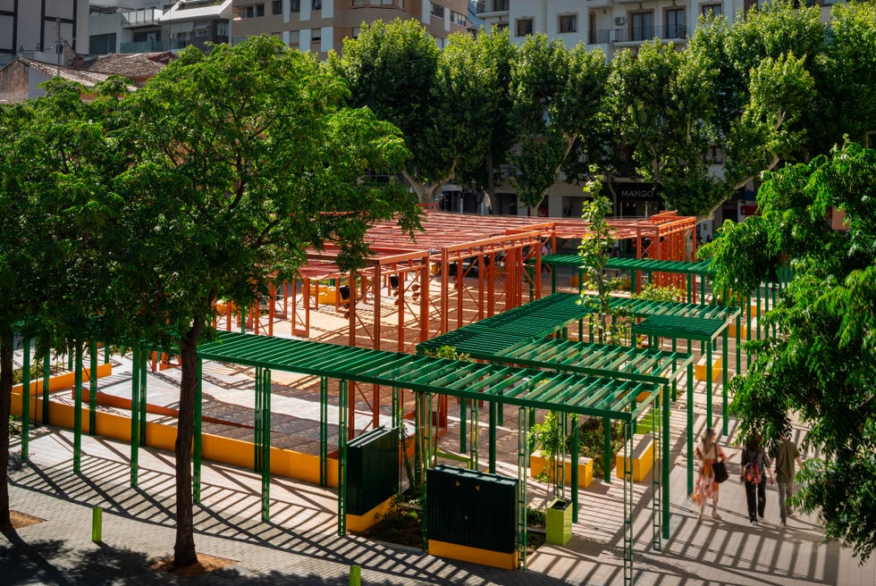 urban construction site with colorful structures and trees