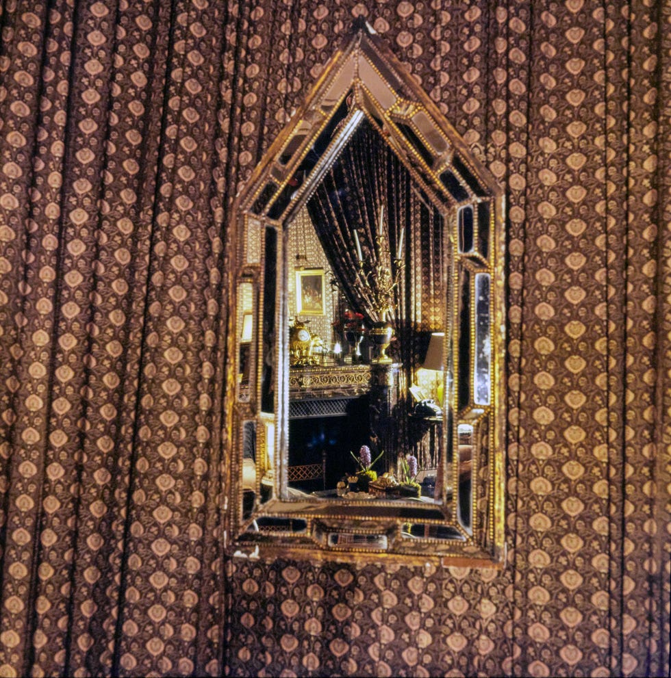 Reflection of a Calico-Draped Hotel Room in a Gothic Mirror, Vogue reflection of a calico draped hotel room in a gothic mirror, vogue