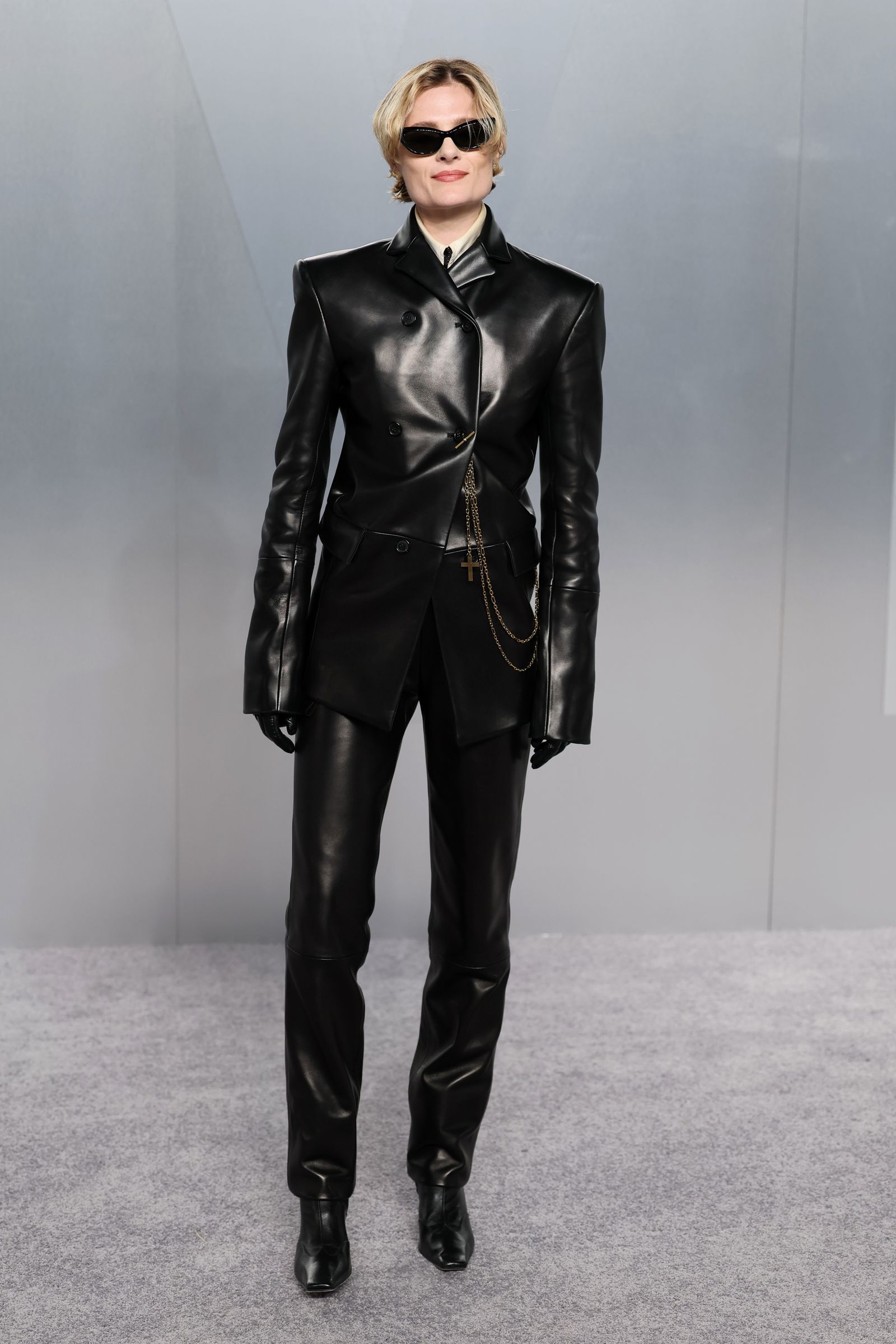 Image may contain Stana Katic Clothing Formal Wear Suit Coat Jacket Blazer Adult and Person