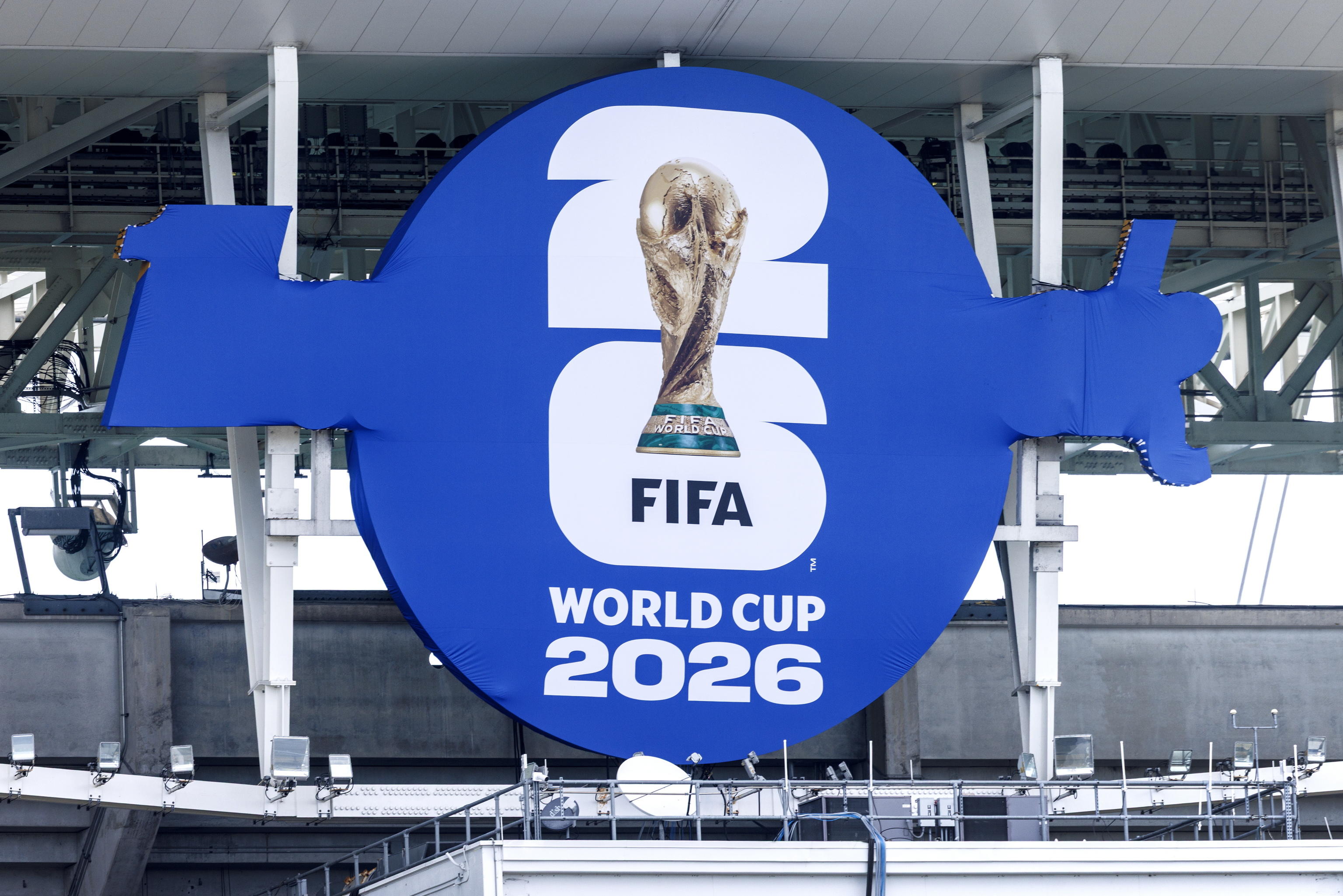 epa13012084 The 2026 FIFA World Cup logo is placed over the original logo of the Hard Rock stadium in Miami, Florida, USA, 02 June 2026. The 2026 FIFA World Cup logo is the first in history to feature the actual trophy, a design for a tournament t...