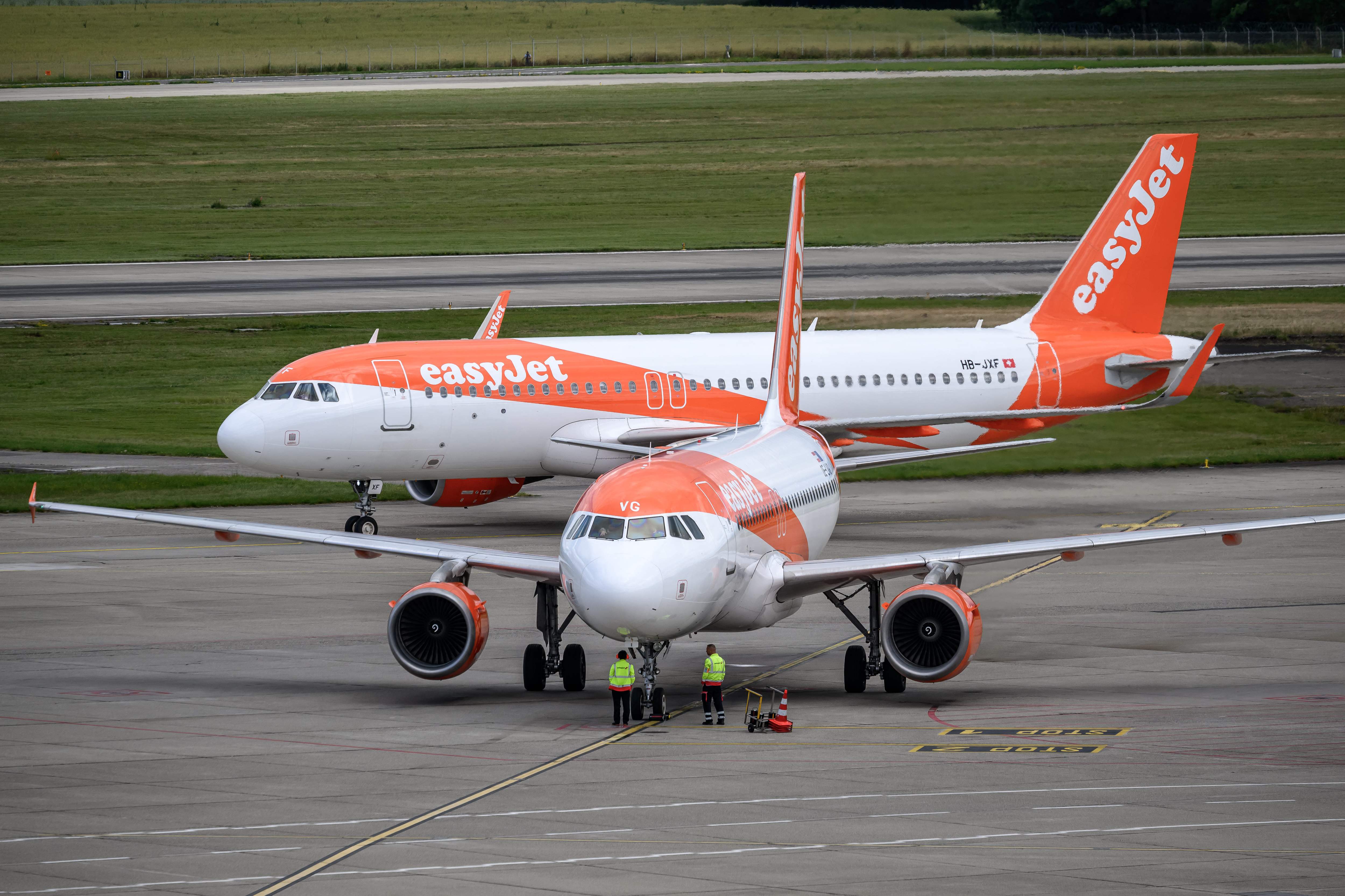 Two Easyjet aircrafts are seen at Geneva Airport on June 11, 2026. British no-frills airline EasyJet denounced as