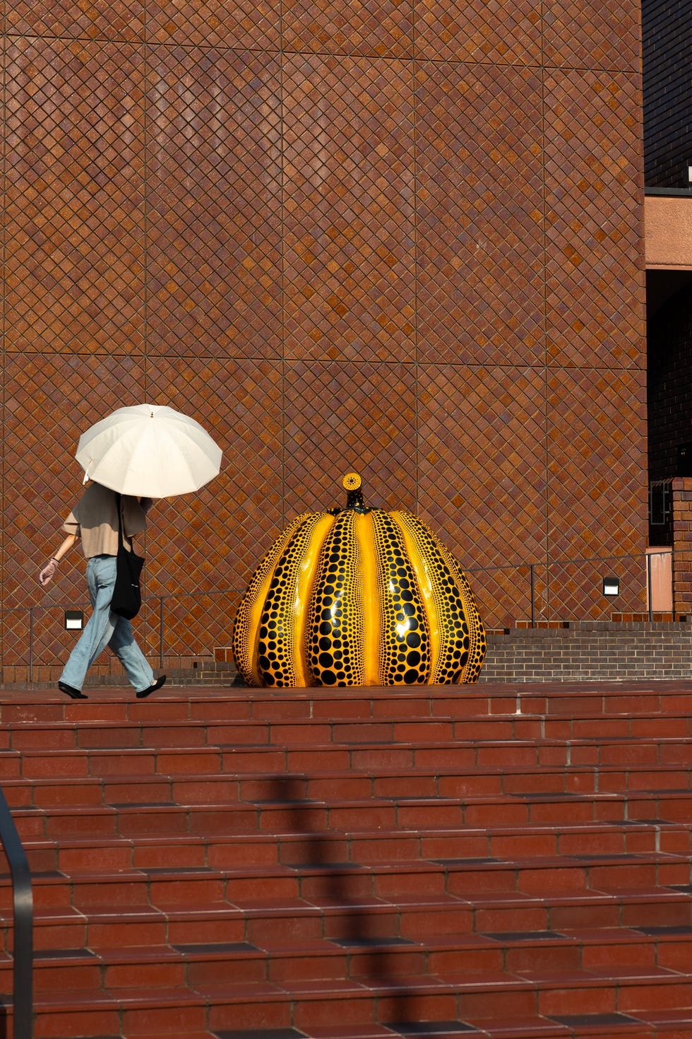 Yellow pumpkin by Yayoi Kusama in Fukuoka Museum of Arts, Kyushu region, Fukuoka, Japan yellow pumpkin by yayoi kusama in fukuoka museum of arts, kyushu region, fukuoka, japan