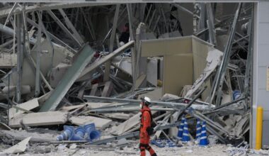 Rescuers search for survivors after a 7.1 quake kills 18 in southwestern Japan