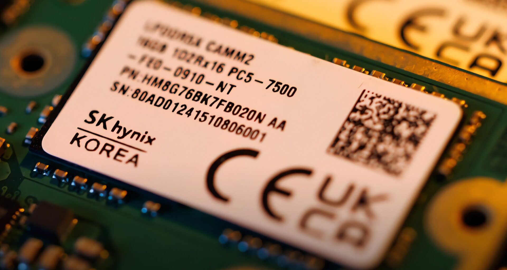 Close up photograph of an SK Hynix memory chip module showing printed technical specifications.