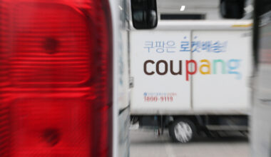 Delivery trucks wait at a Coupang logistics center in Seoul. Yonhap News - Seoul Economic Daily Finance News from South Korea