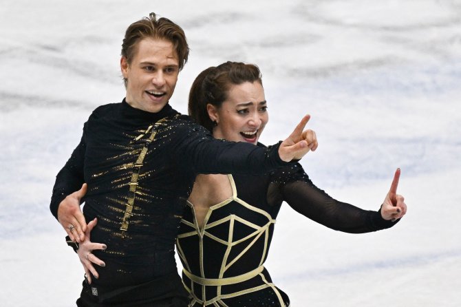 AFP nuotr./Saulius Ambrulevičius ir Allison Reed