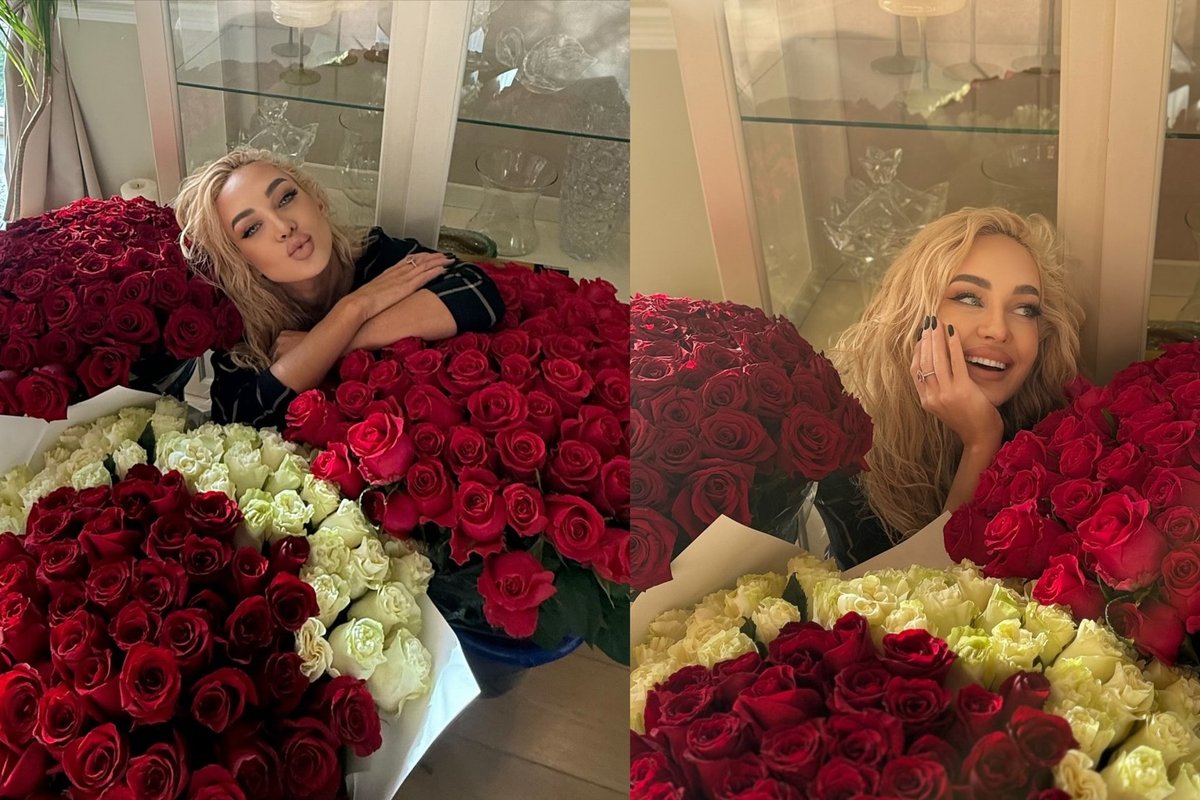 Gėlėse paskendusią Oksaną Pikul sunku įžiūrėti: gerbėjas įteikė rekordinį skaičių rožių