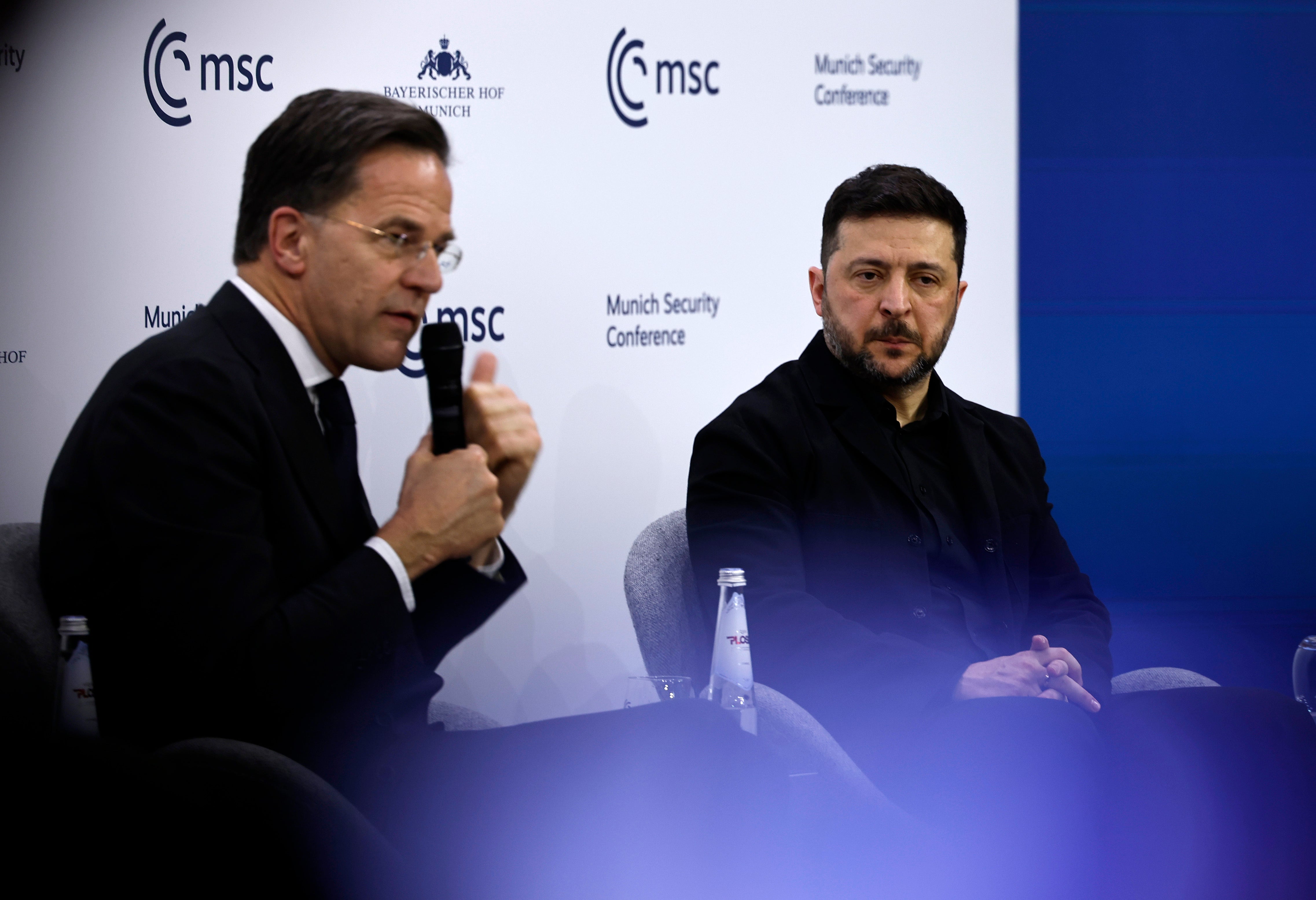 Ukrainian president Volodymyr Zelensky and general secretary of the NATO Mark Rutte discuss on stage at the 62nd Munich Security Conference on February 14, 2026