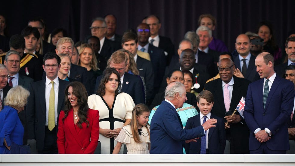 britains catherine, princess of wales (2l) britains prince william, prince of wales (r), britains prince george of wales (2r), and britains princess charlotte of wales stand as britains king charles iii (3r) and britains queen camilla (l) arrive to attend the coronation concert at windsor castle in windsor, west of london on may 7, 2023. for the first time ever, the east terrace of windsor castle will host a spectacular live concert that will also be seen in over 100 countries around the world. the event will be attended by 20,000 members of the public from across the uk. (photo by yui mok / pool / afp) (photo by yui mok/pool/afp via getty images)