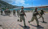 Leden van een Bolivariaanse Volksmilitie tijdens een militaire training in La Guaira, Venezuela, 8 oktober.