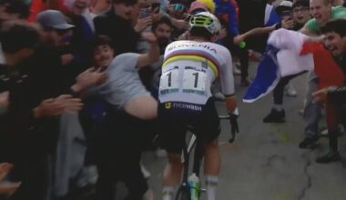 Toeschouwers belagen Pogacar op EK wielrennen: trappende beweging en stickers op rug