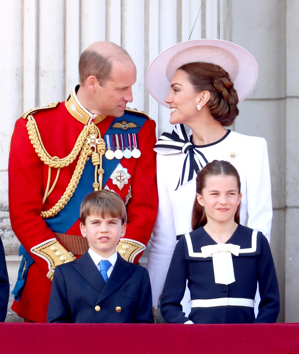 london, england june 15 l r prince george of wales, prince william, prince of wales, prince louis of wales, catherine, princess of wales and princess charlotte of wales on the balcony during trooping the colour at buckingham palace on june 15, 2024 in london, england trooping the colour is a ceremonial parade celebrating the official birthday of the british monarch the event features over 1,400 soldiers and officers, accompanied by 200 horses more than 400 musicians from ten different bands and corps of drums march and perform in perfect harmony photo by chris jacksongetty images