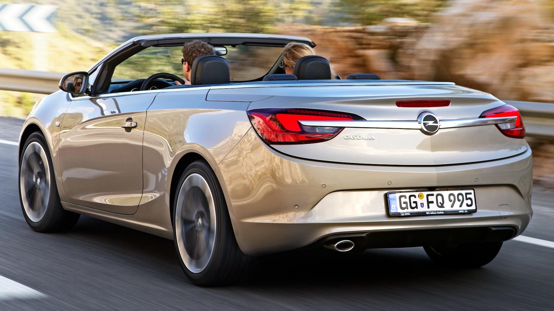 Opel Cascada grijs (2013) zijkant links schuin achter rijdend