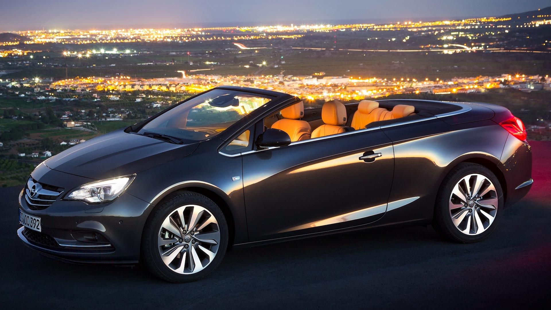 Opel Cascada donkergrijs (2013) zijkant links schuin voor dak omlaag