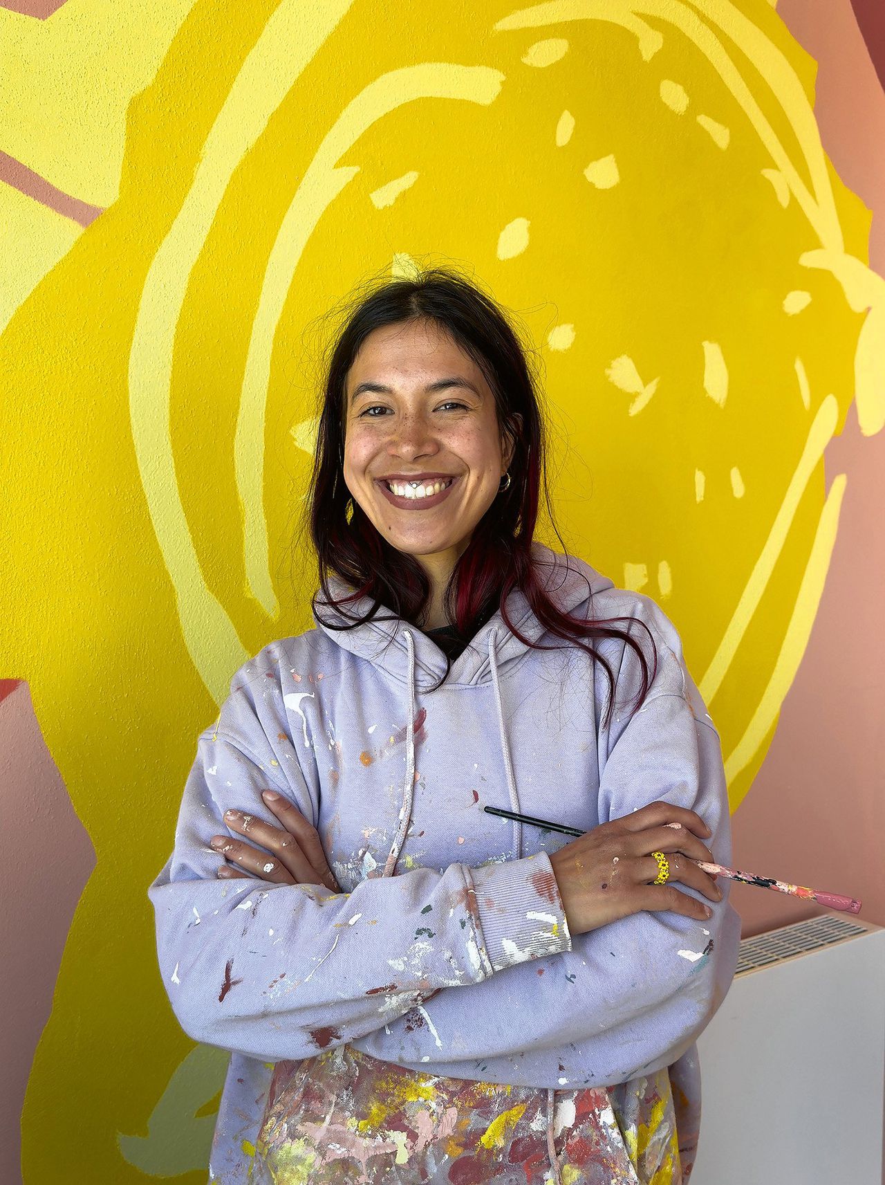 Dewy Elsinga maakt muurschilderingen in het Fenix museum. Rotterdam,  11 april 2025 