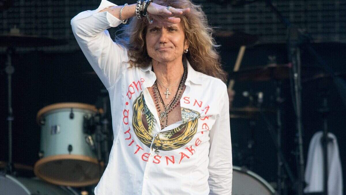 epa05455495 David Coverdale, singer of British band Whitesnake, performs at the Wacken Open Air, in Wacken, Germany, 04 August 2016. The W:O:A festival is the world's largest heavy metal music event and runs until 06 August.  EPA/AXEL HEIMKEN
