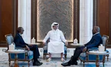 President Felix Tshisekedi van Congo (r.) en president Paul Kagame van Rwanda tijdens hun ontmoeting met emir Sheikh Tamim bin Hamad Al Thani in Doha, Qatar.