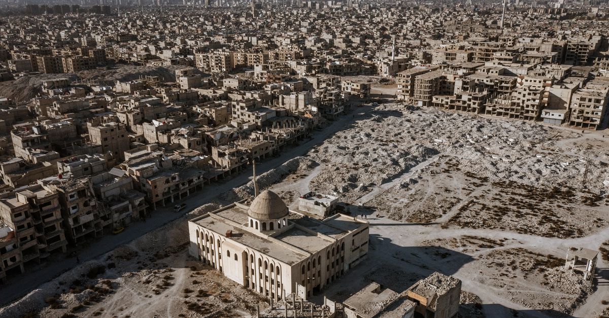 In deze wijk in Damascus leven Assads handlangers en slachtoffers naast elkaar. 'De honden vinden alsmaar nieuwe massagraven'