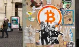Een bitcoinlogo op een muur in Parijs. Foto Stéphanse Mouchmouche/AFP